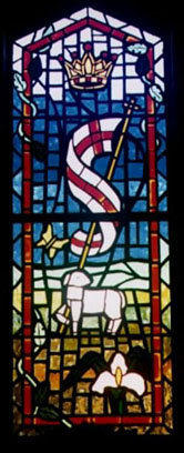 A stained glass window depicting the ressurection from the Apostle's Creed.